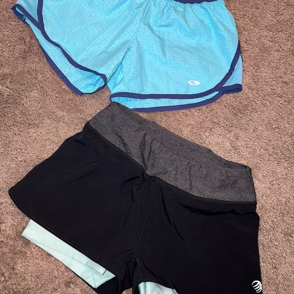 ATHLETIC SHORTS BUNDLE. 2 pairs of atheletic shorts, both size small.